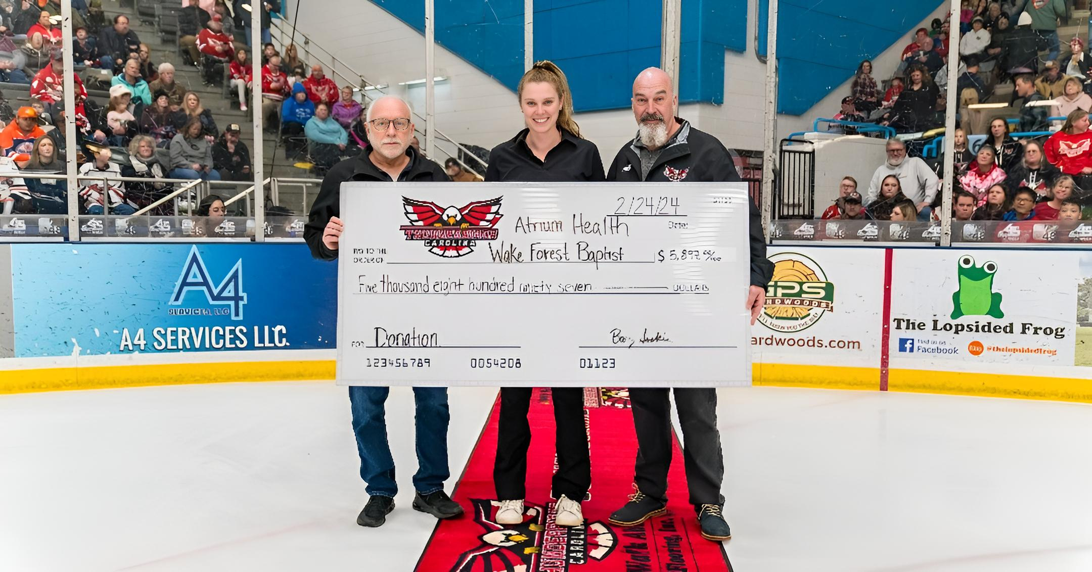 The Cancer Awareness Night jersey auction scored a whopping $5,897 - Atrium Health Wake Forest Baptist